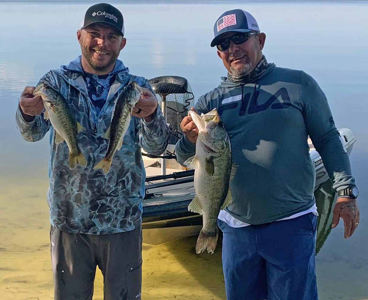 Dustin Meneley, left, and Arnold Avilla took big bass with this 5.70 pounder Avilla caught during the Bass N Boats open tournament Jan. 15 on Lake Alfred.