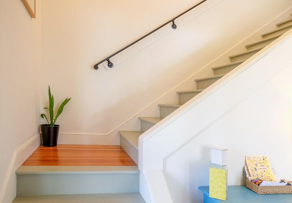 The home was renovated by the previous owner, including the addition of this decorative stairway.