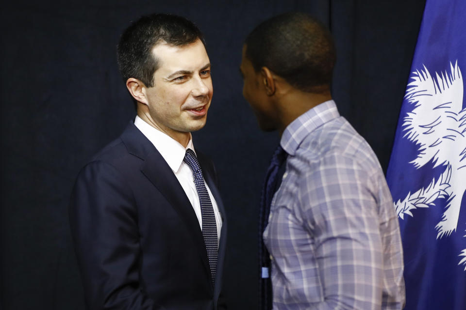 Democratic presidential candidate former South Bend, Ind., Mayor Pete Buttigieg, left, shakes hands with Jalen Elrod, after a roundtable discussing health equity, Thursday, Feb. 27, 2020, at the Nicholtown Missionary Baptist Church in Greenville, S.C. (AP Photo/Matt Rourke)