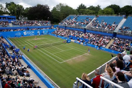 Tennis - WTA Premier - Aegon Classic - Edgbaston Priory Club, Birmingham, Britain - June 25, 2017 Czech Republic's Petra Kvitova (R) in action with Australia's Ashleigh Barty (L) the final Action Images via Reuters/Peter Cziborra