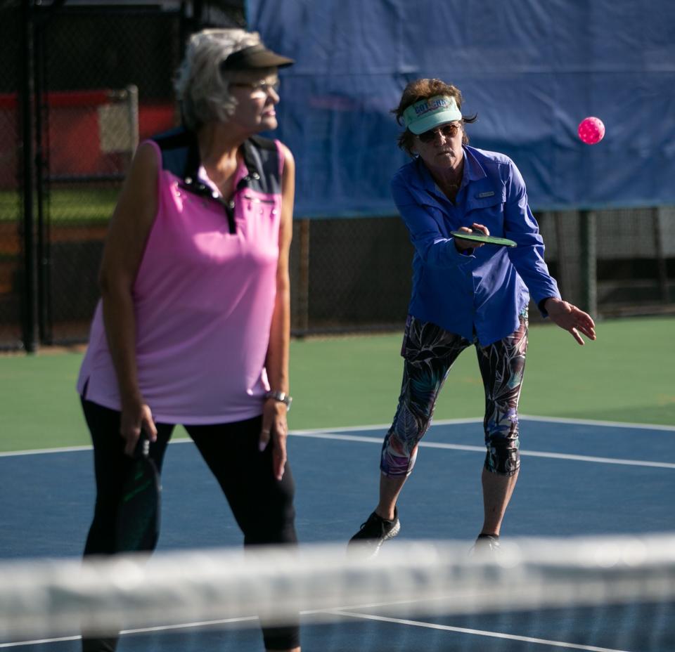 Linda Lane plays pickleball with her friends at Winthrop Park on Friday, March 31, 2023. 