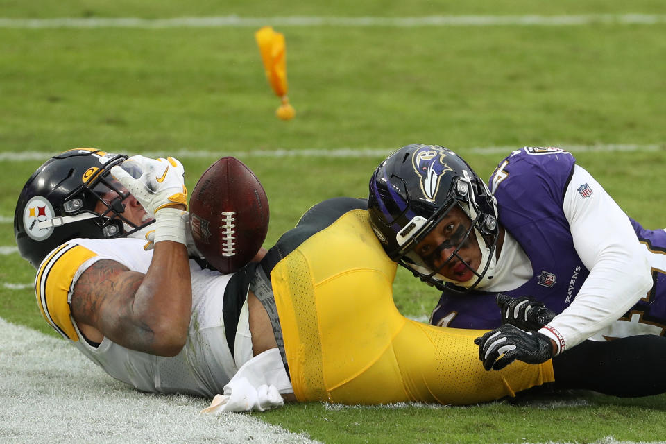 Cornerback Marlon Humphrey tackles Steelers wide receiver Chase Claypool.