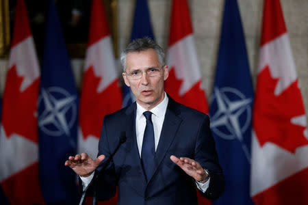 NATO Secretary General Jens Stoltenberg speaks during a news conference with Canada's Prime Minister Justin Trudeau on Parliament Hill in Ottawa, Ontario, Canada, April 4, 2018. REUTERS/Chris Wattie