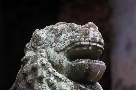 A sculpture at Sambor Prei Kuk, or "the temple in the richness of the forest" an archaeological site of ancient Ishanapura, is seen, at the UNESCO world heritage site, in Kampong Thom province, Cambodia July 16, 2017. Picture taken July 16, 2017. REUTERS/Samrang Pring