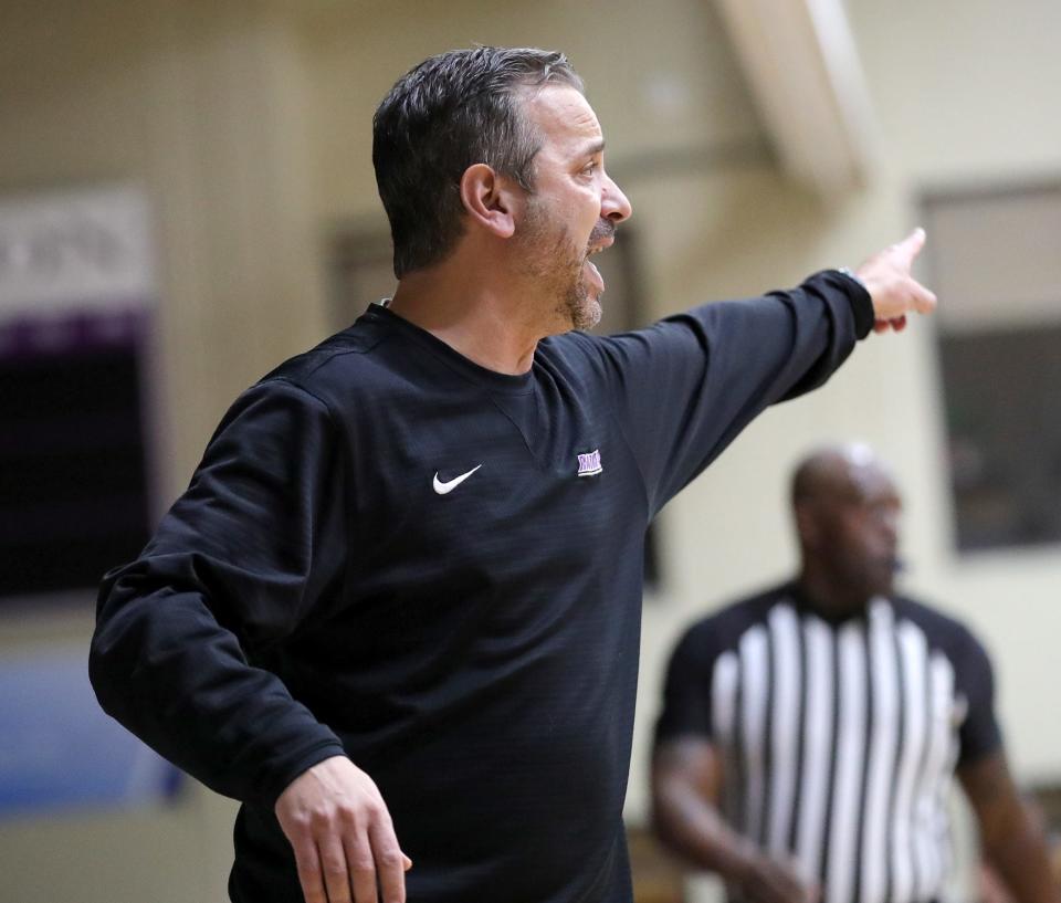 Mount Union men's basketball head coach Mike Fuline directs his team during last week's Ohio Athletic Conference Tournament semifinal game against Heidelberg.
