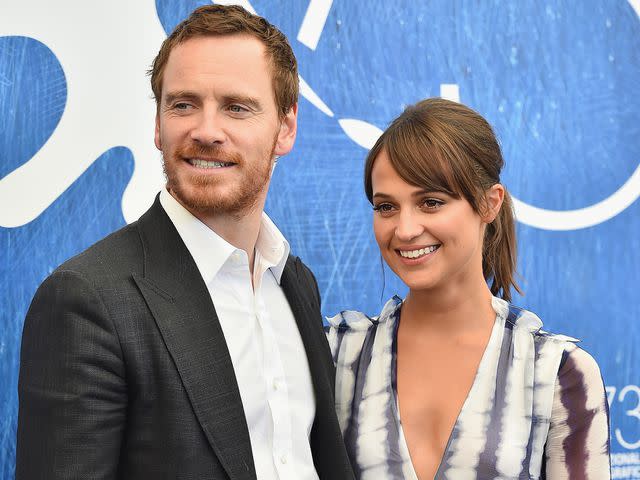 <p>Stefania D'Alessandro/WireImage</p> Michael Fassbender and Alicia Vikander attend a photocall for 'The Light Between Oceans' during the 73rd Venice Film Festival in September 2016.