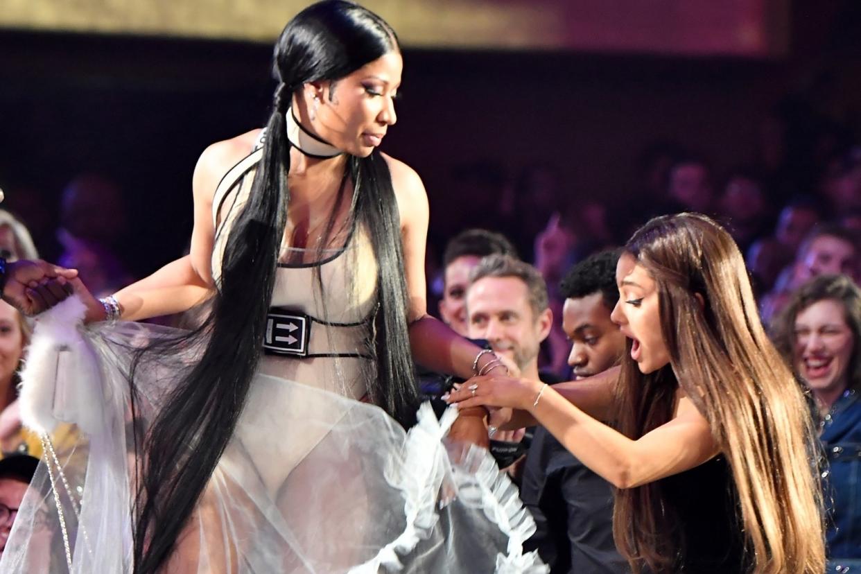 Friendship goals: Ariana Grande helps Nicki Minaj onto the stage: FilmMagic
