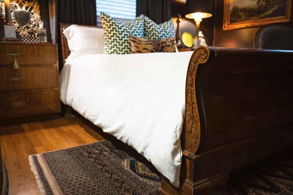 Designer and real estate professional Jamie Bertolini used his 'splurge and save' method to get the look he wanted. The signed rug and Henredon bed demonstrate his emphasis on splurging on worthy items and saving on others.