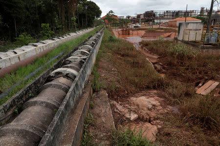 FILE PHOTO: Concrete pipes connecting the bauxite residue deposit to its water treatment station are pictured at the alumina refinery Alunorte, owned by Norwegian company Norsk Hydro ASA, in Barcarena, Para state, Brazil March 5, 2018. REUTERS/Ricardo Moraes/File Photo