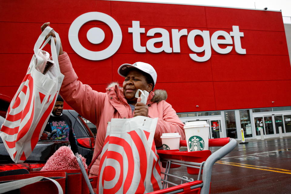 Shoppers exit a Target store during Black Friday sales in Brooklyn, New York, U.S., November 26, 2021.  REUTERS/Brendan McDermid