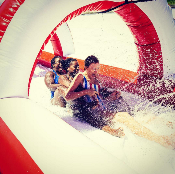 Swift maintained her reputation as a great hostess, going down the slide with pretty much everyone. Here she is with Uzo and her sister Chioma. (Photo: Instagram)