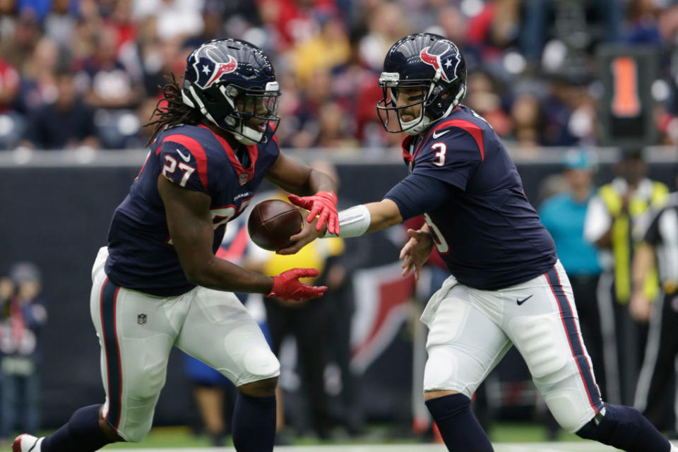 D’Onta Foreman takes the handoff from QB Tom Savage. (Getty)