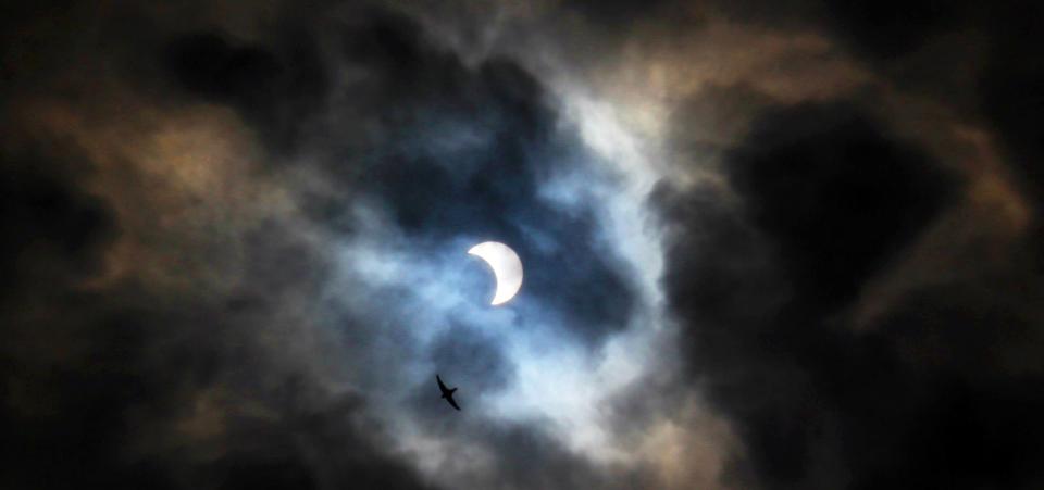 Even if it is partly cloudy, a solar eclipse could still be spectacular as seen in this 2017 photo.
