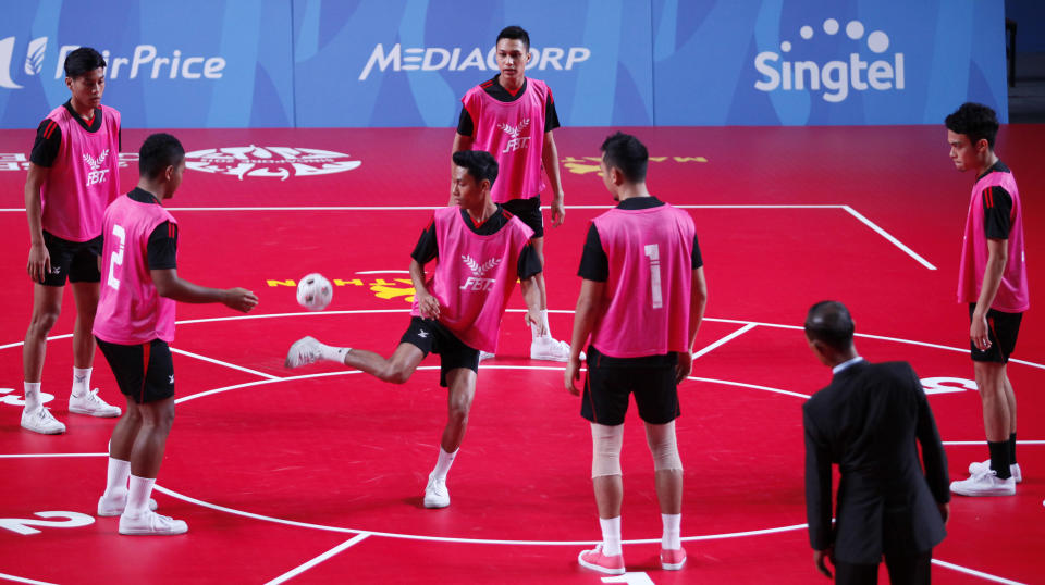 28th SEA Games Singapore 2015 - Expo Hall 1 - 6/6/15   Chinlone - Linking - Group - Singapore's Muhammad Izwandy Zamri (3rd from L) in action  SEAGAMES28 TEAMSINGAPORE  Mandatory Credit: Singapore SEA Games Organising Committee / Action Images via Reuters