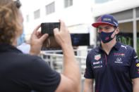 Red Bull driver Max Verstappen, of the Netherlands, sends a message by video before the Formula One U.S. Grand Prix auto race at Circuit of the Americas, Thursday, Oct. 21, 2021, in Austin, Texas. (AP Photo/Nick Didlick)