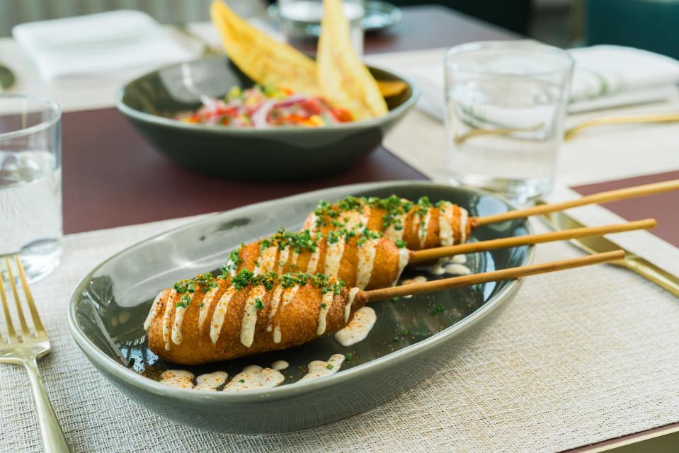 Florida lobster corn dogs are popular at The House, a new restaurant in West Palm Beach.