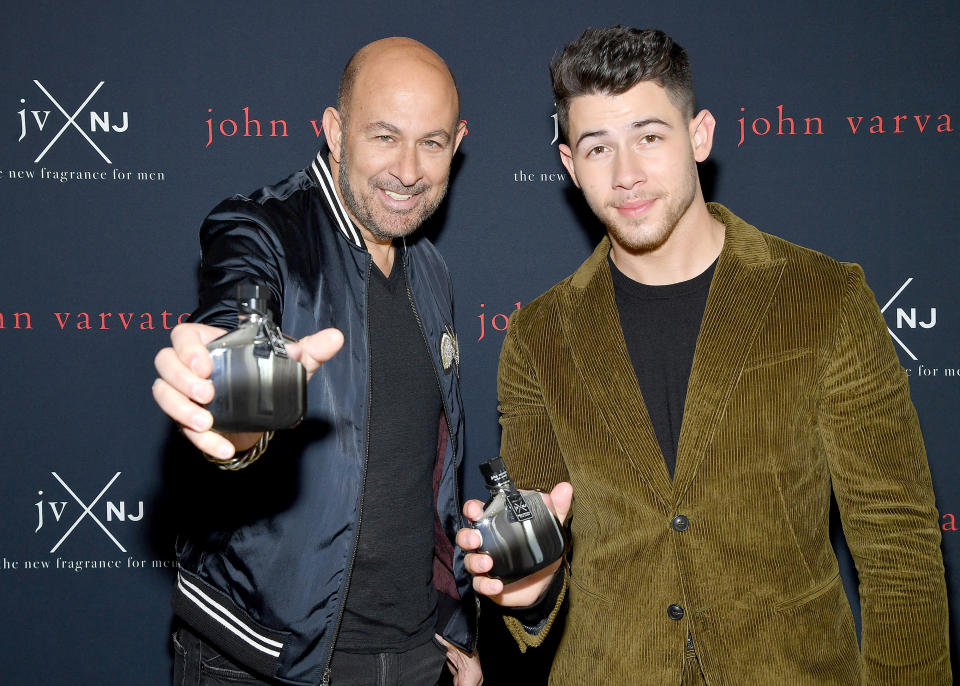 John Varvatos and Jonas launch their new fragrance JVxNJ Silver Edition. (Photo: Getty Images)