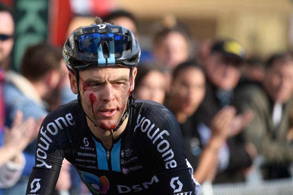 DSM team Australian rider Christopher Hamilton crosses the finish line after falling during the 1st stage of the 2023 Tour of Catalonia cycling race a 1645 km loop starting and finishing in Sant Feliu de Guixols on March 20 2023 Photo by Josep LAGO  AFP Photo by JOSEP LAGOAFP via Getty Images