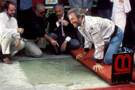 <p>The actor couldn't have smiled more at his 1984 hand and footprint ceremony outside Mann's Chinese Theater in Hollywood. </p>