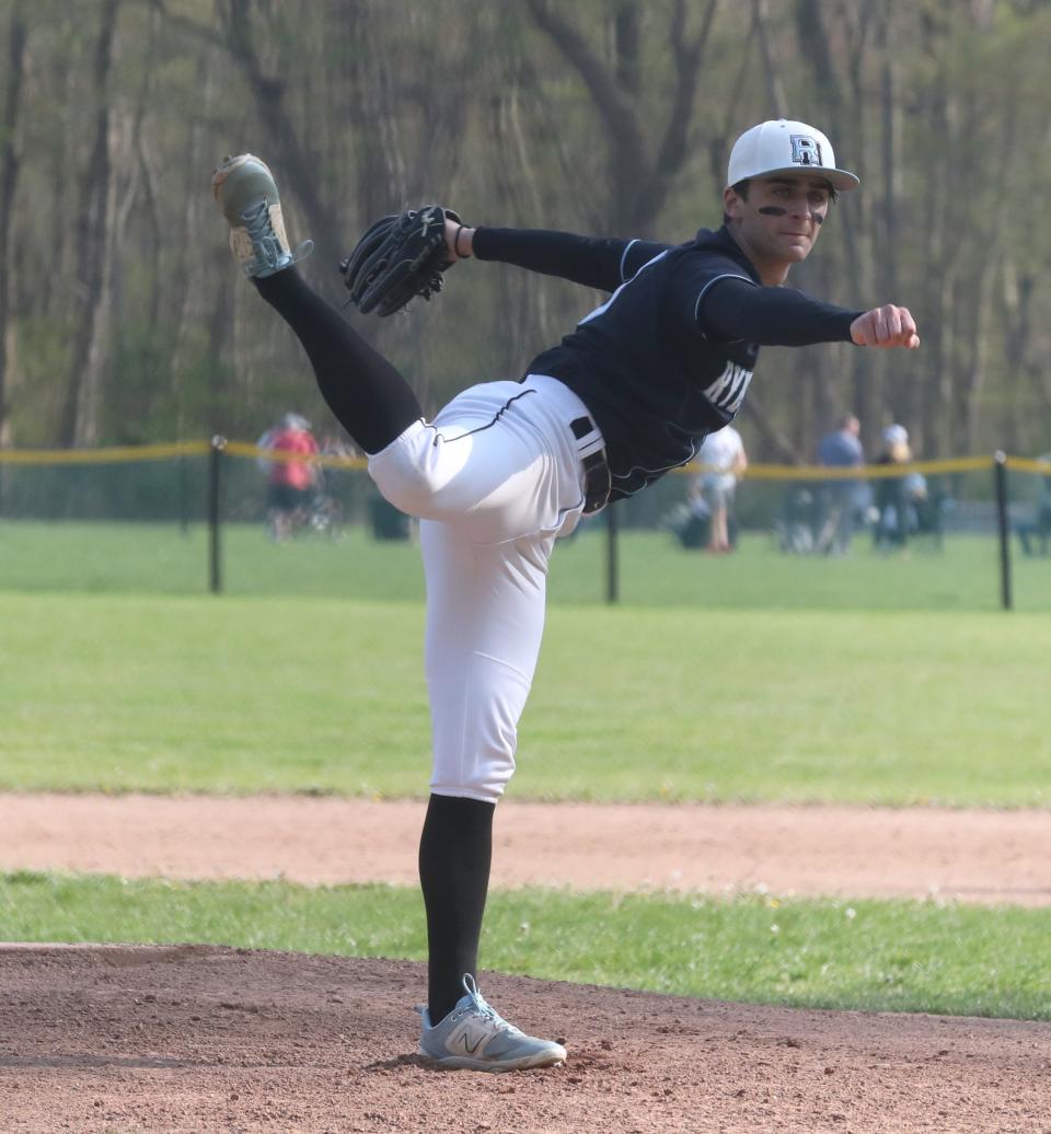 Rye Neck's George Katsaros delivers a pitch during a game with Pleasantville at Rye Neck April 27, 2024. The game was suspended because of lightning.