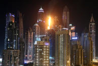 <p>The Torch Tower Residence block is pictured on fire in Dubai Marina on Aug. 4, 2017 in Dubai, U.A.E. (Photo: Trevor Goddard/Getty Images) </p>