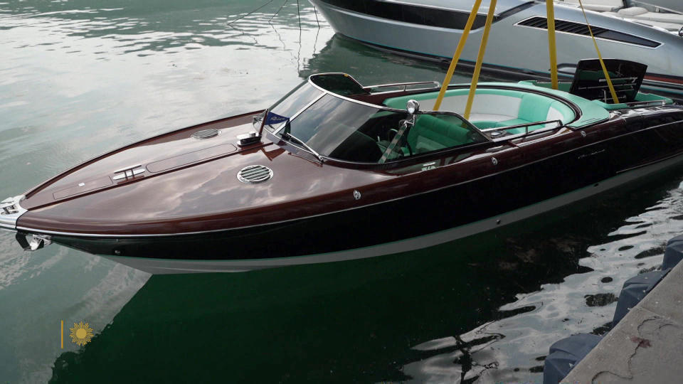 Riva's Anniversario model is launched at the company's shipyard in Sarnico, Italy. To mark the 180th anniversary of the Riva shipbuilding company, they are producing a limited edition of this design - 18 in all.   / Credit: CBS News