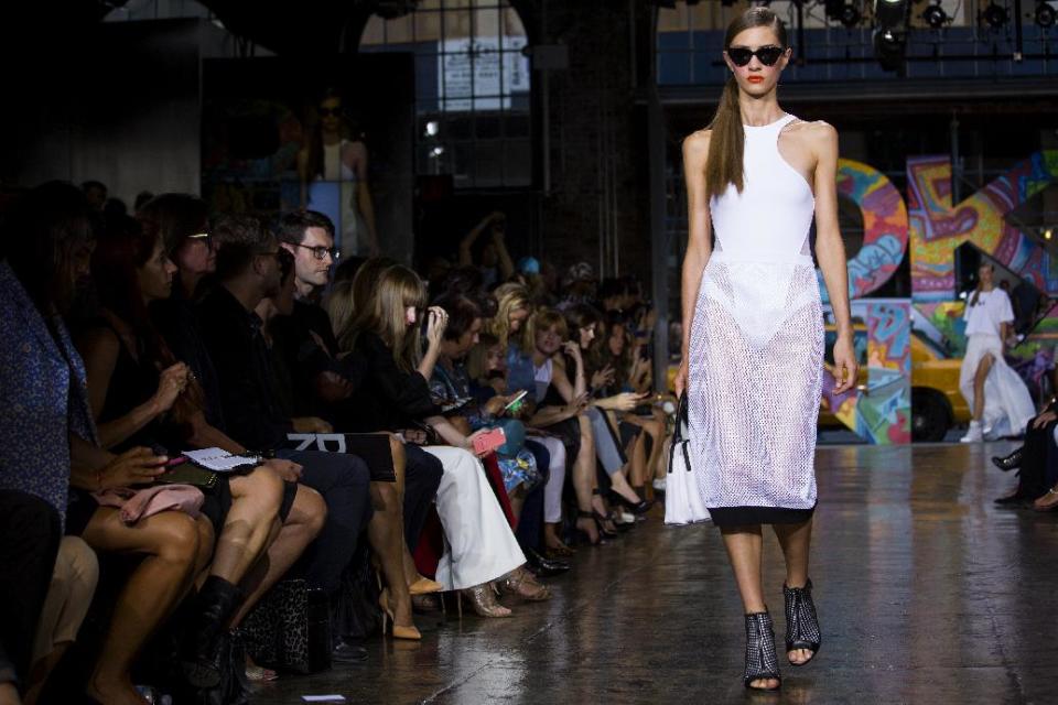 The DKNY Spring 2014 collection is modeled during Fashion Week in New York, Sunday, Sept. 8, 2013. (AP Photo/Craig Ruttle)