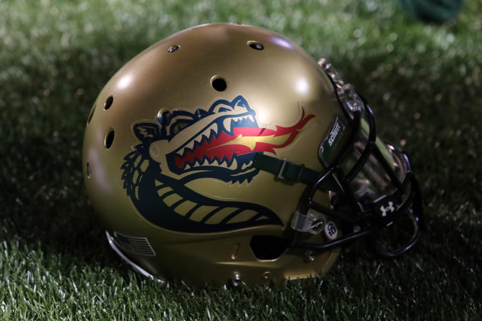 Helmet showing the UAB Blazer helmet with a dragon.