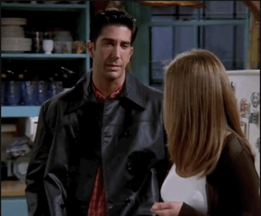 Ross from "Friends" shrugging at Rachel