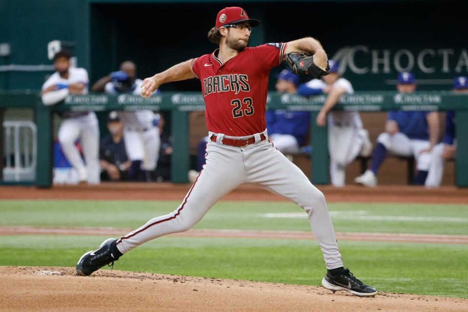 Arizona Diamondbacks starting pitcher Zac Gallen (23) throws during the first inning of a baseball game against the Texas Rangers, Tuesday, May 2, 2023, in Arlington, Texas. (AP Photo/Michael Ainsworth)