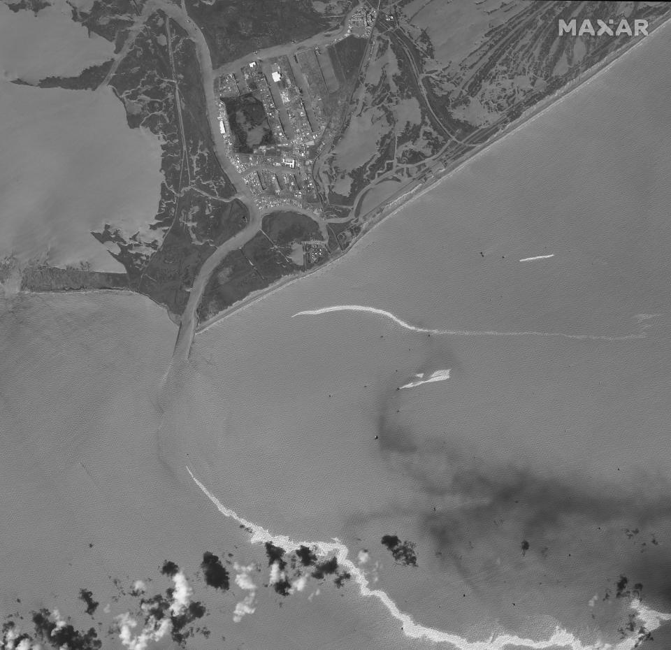 This satellite image provided by Maxar Technologies shows an overview of Port Fourchon, La., and oil slicks on Sept. 2, 2021. The U.S. Coast Guard said Saturday, Sept. 4, that cleanup crews are responding to a sizable oil spill in the Gulf of Mexico following Hurricane Ida. (Maxar Technologies via AP)