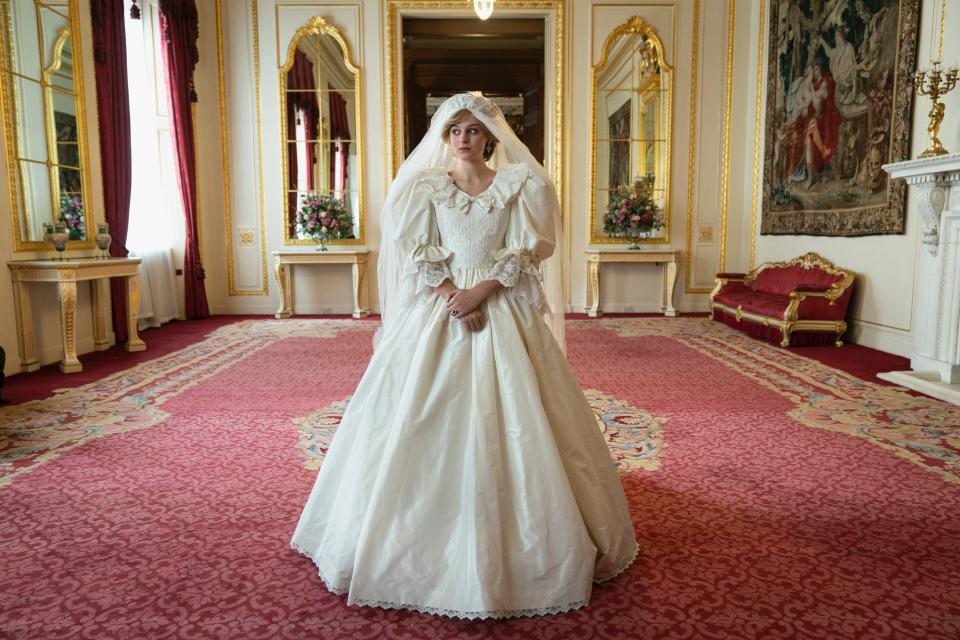 Emma Corrin wears a replica of Princess Diana's iconic wedding dress on Season 4 of "The Crown."