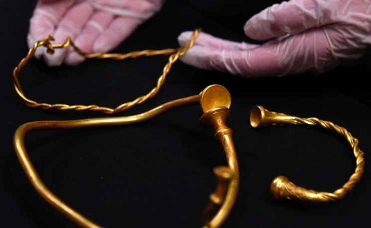 The gold is estimated to be 2,500 years old (PA)