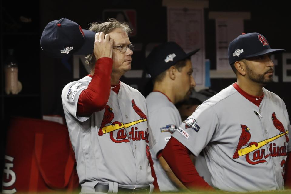 St. Louis Cardinals manager Mike Shildt scratches his head during the eighth inning of Game 3 of the baseball National League Championship Series against the Washington Nationals Monday, Oct. 14, 2019, in Washington. (AP Photo/Jeff Roberson)