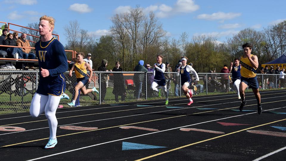 Shea Ruddy of Whiteford wins the 100 meters in a meet against Erie Mason and Summerfield on Tuesday, April 18, 2023.