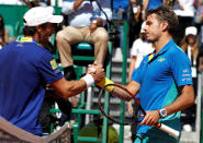 Tennis - Monte Carlo Masters - Monaco, 20/04/2017. Stan Wawrinka of Switzerland (R) shakes hand with Pablo Cuevas of Uruguay after their match. REUTERS/Eric Gaillard