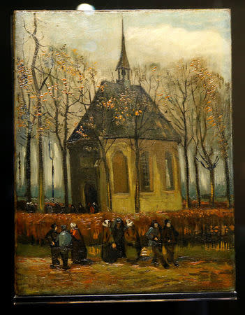 The canvas "Congregation Leaving The Reformed Church in Nuenen", one of the two recovered paintings by Vincent van Gogh which were stolen from the Van Gogh Museum in 2002, is pictured at the van Gogh Museum in Amsterdam, Netherlands March 21, 2017. REUTERS/Michael Kooren