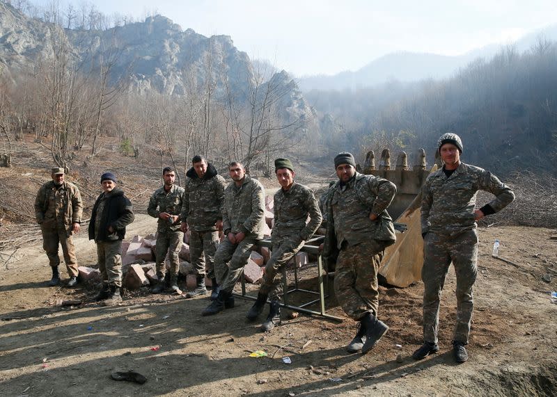 Ethnic Armenian soldiers are seen in the village of Knaravan