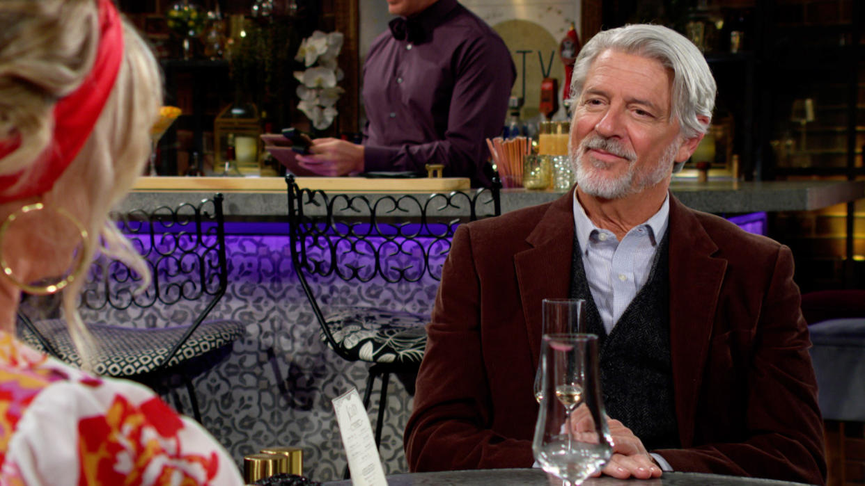  Christopher Cousins as Alan sitting at a restaurant in The Young and the Restless. 