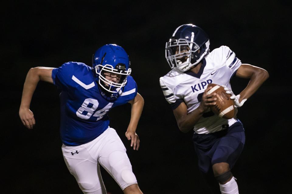 KIPP Columbus quarterback Tymir Wynn (right) was named second-team all-state in Division IV.