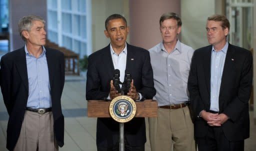 US President Barack Obama speaks alongside Colorado's governor and US senators at the University of Colorado Hospital in Aurora, Colorado, on July 22. His hair dyed orange, eyes staring out blankly or drooping shut, presumed Colorado gunman James Holmes seemed unhinged Monday as he made a bizarre first appearance in court