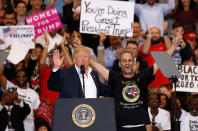 <p>U.S. President Donald Trump invites a supporter onstage with him during a “Make America Great Again” rally at Orlando Melbourne International Airport in Melbourne, Florida, U.S. February 18, 2017. (REUTERS/Kevin Lamarque) </p>