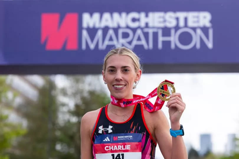 Charlie Arnell was the first woman through the 2024 finish line, with a time of 2:37:12