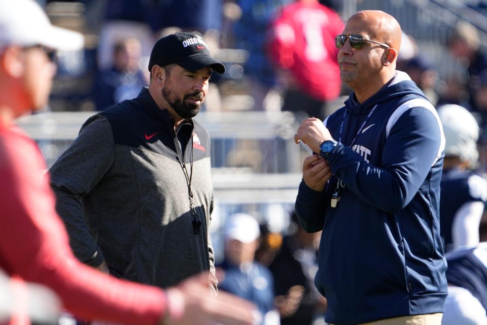 Oct 29, 2022; University Park, Pennsylvania, USA; Ohio State Buckeyes head coach Ryan Day talks to Penn State Nittany Lions head coach James Franklin prior to the NCAA Division I football game at Beaver Stadium. Mandatory Credit: Adam Cairns-The Columbus Dispatch