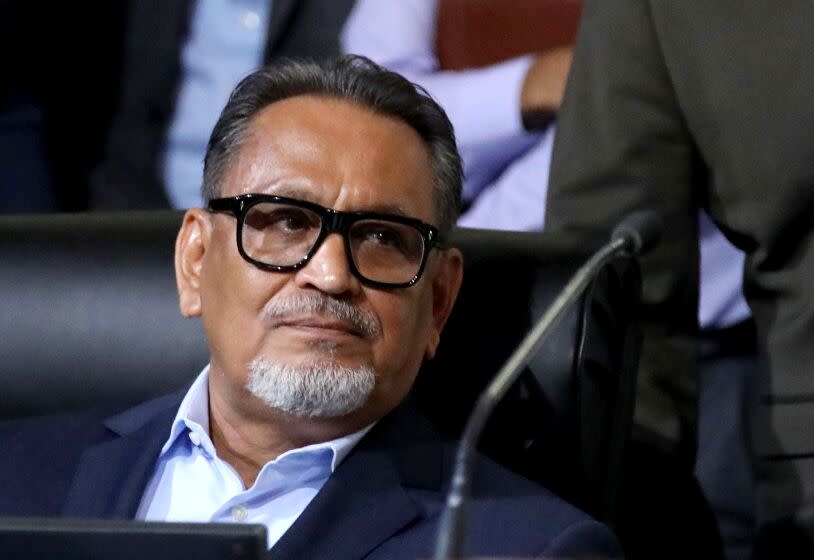 LOS ANGELES, CA - OCTOBER 11: Councilmember District 1 - Gil Cedillo at the Los Angeles City Council meeting at Los Angeles City Hall on Tuesday, Oct. 11, 2022 in Los Angeles, CA. Protestors want the resignation of Los Angeles Councilmembers Nury Martinez, Kevin de Leon and Gil Cedillo. Martinez made racist remarks about Councilmember Mike Bonin son in the recording as her colleagues, Councilmembers Kevin de Leon and Gill Cedillo, laughed and made wisecracks. (Gary Coronado / Los Angeles Times)