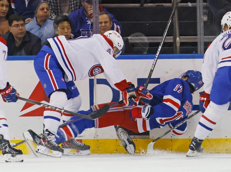 NEW YORK, NEW YORK - FEBRUARY 15: Blake Wheeler #17 of the New York Rangers is injured during the first period on a check by Jayden Struble #47 of the Montreal Canadiens at Madison Square Garden on February 15, 2024 in New York City.