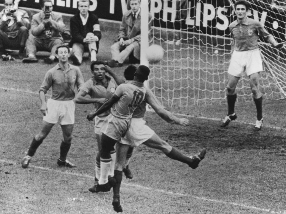 Brazilian forwards Vava and Pelé (number 10) enter a melee in front of the French goal during the World Cup semi-final at the Rasunda Stadion in Solna, Stockholm, 24th June 1958. Brazil beat France 5-2. (Photo by Keystone/Hulton Archive/Getty Images)