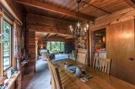 <p><span>15450 27A Avenue, Surrey, B.C.</span><br> The Pan Abode home feels like a cabin, with its wood panelling throughout.<br> (Photo: Zoocasa) </p>