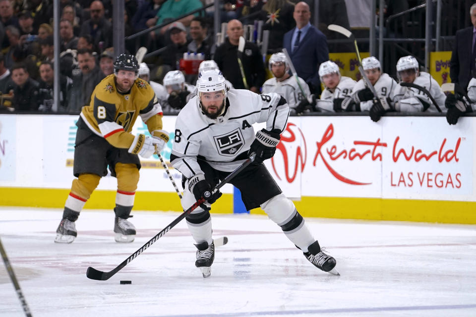 Los Angeles Kings defenseman Drew Doughty (8) skates with the puck during the third period of the team's NHL hockey game against the Vegas Golden Knights on Thursday, April 6, 2023, in Las Vegas. (AP Photo/Lucas Peltier)