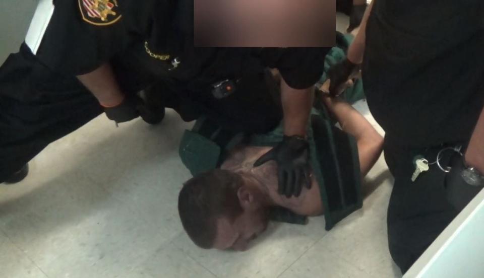 Alexander Rios, 28, of Wakeman, was being restrained by Richland County Jail corrections officers who wanted to place him in a restraint chair on Sept. 19, 2019.